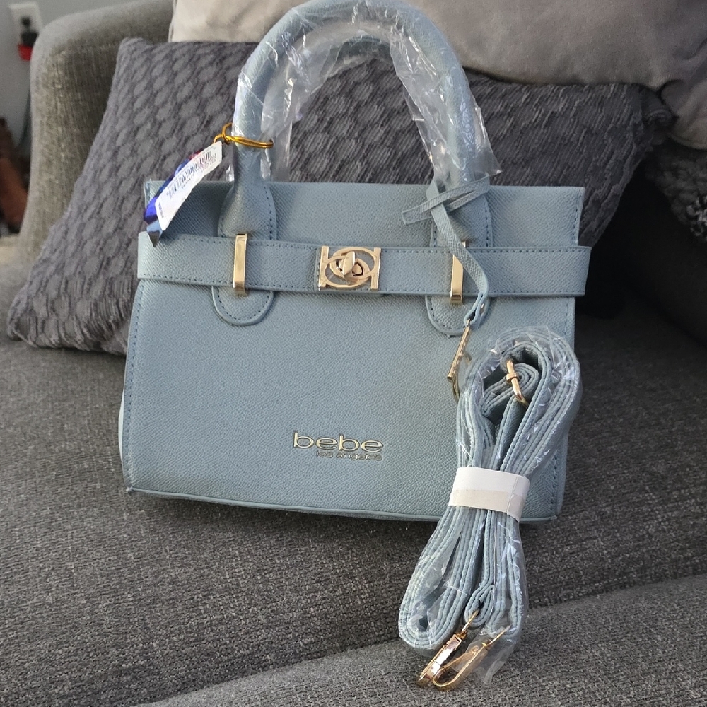 Bebe Light Blue Satchel with Gold Accents And Crossbody Strap.